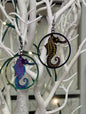 Oil slick seahorse earrings  April & Mae designs and alterations    